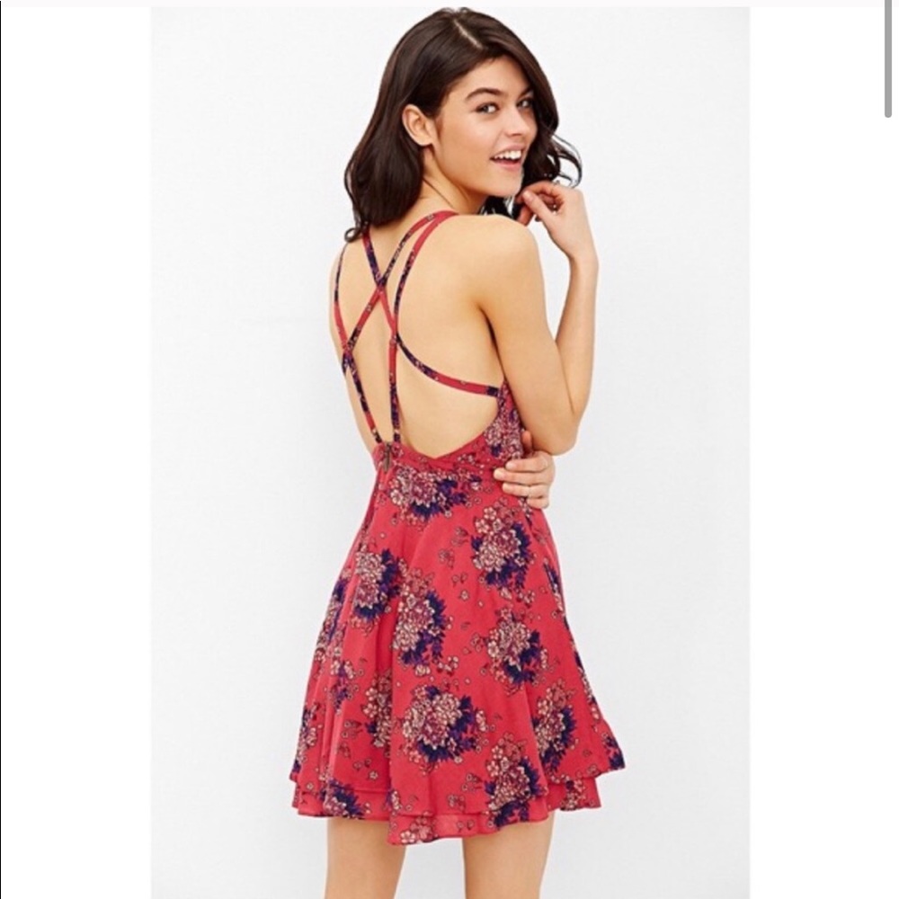 Pink floral strappy Kimchi Blue dress.